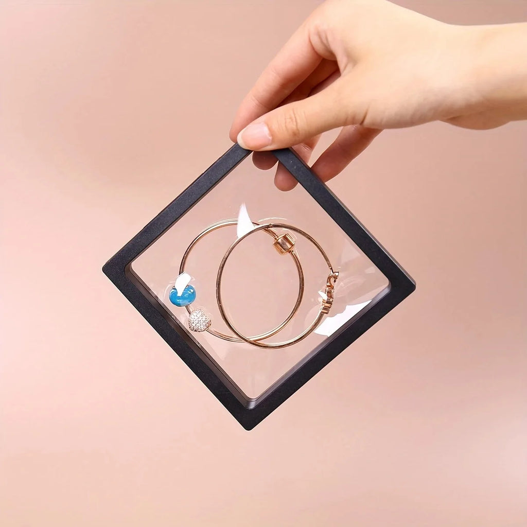 Transparent floating display box, plastic film jewelry packaging box, jewelry, necklace, ring, and collectible storage box